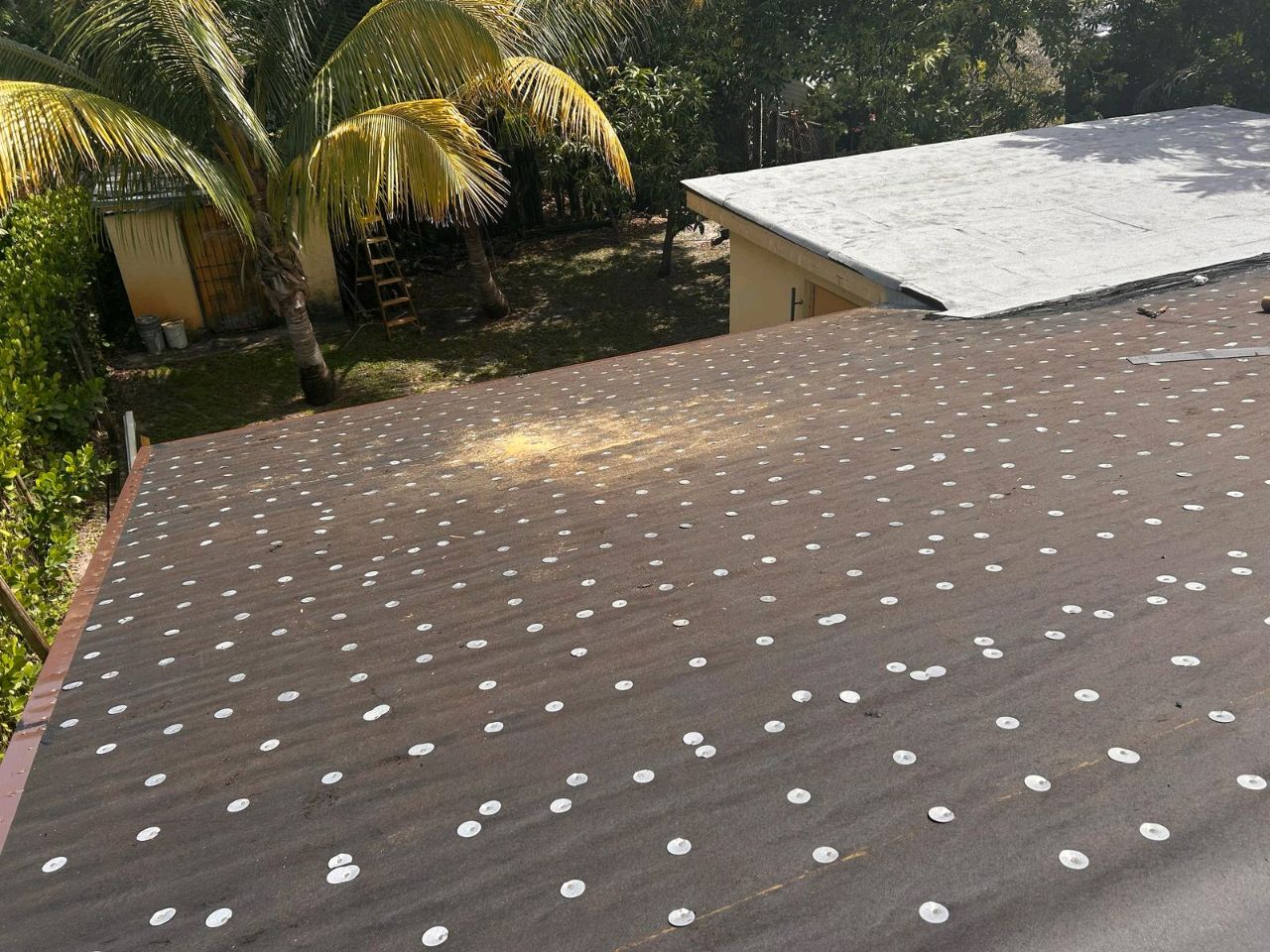 Front view of Robert Lewis’s home showing old roof before Hurricane Safety Program upgrades